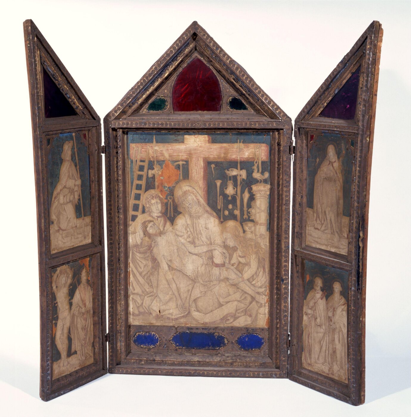 Unknown, Triptych with The Lamentation, with St John the Evangelist and St Mary Magdalene, and the emblems of the Passion; (Left shutter): St. James, St. Sebastian and Saint Blaise; (Right shutter): St. John the Baptist, St. Peter and St. Paul