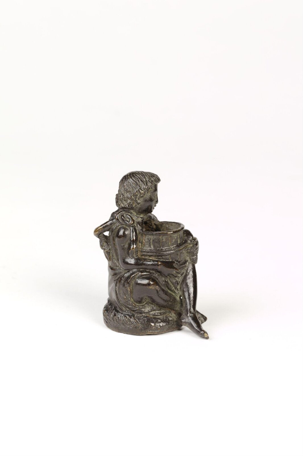 Seated boy holding a tub, 19th century