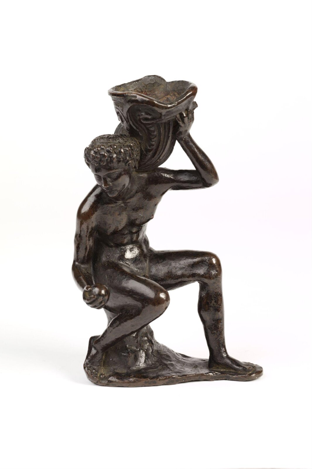 A seated boy holding a shell, ca. 1510-1530