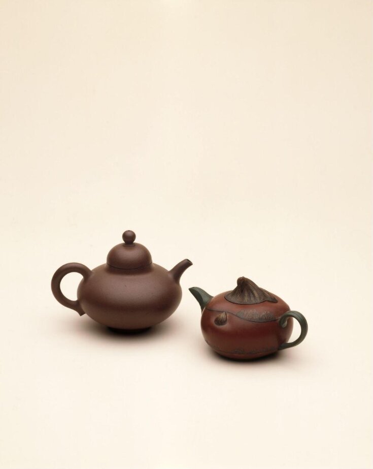 Yixing stoneware teapot with lid top image