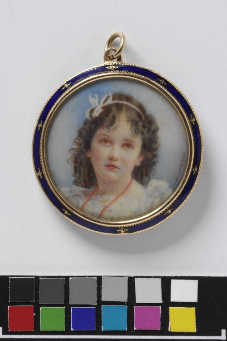 Double-sided locket containing two portrait minitures of unknown girls top image