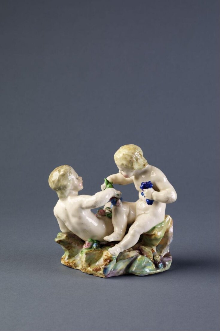 Two putti with grapes image