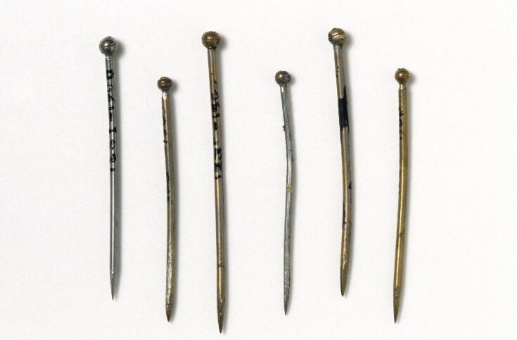 1620-1635 ca.  Pin For Fastening Clothing, Made In Gloucestershire, England, U.K. Pins were a necessity for the fastening of clothing and the arrangement of dress accessories in the 16th and 17th centuries. Their importance for women as a personal requirement and expense is reflected in the term pin-money, the sum originally allocated to meet this essential cost. via Victoria and Albert Museum, London, U.K.