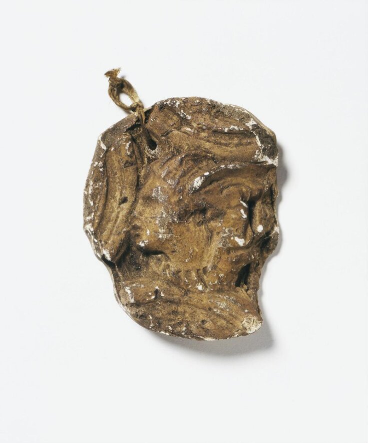 Winged head top image