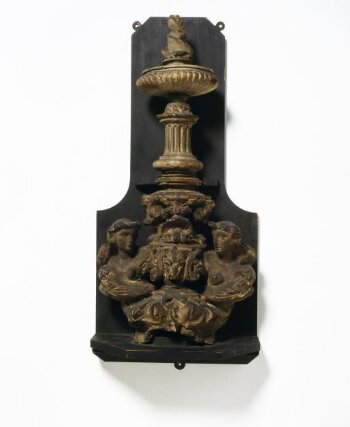 Finial of a fire-dog