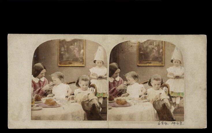 One o'Clock', children at table top image