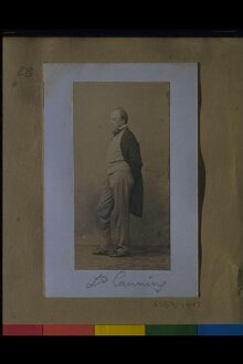 Photograph of man standing in profile thumbnail 1