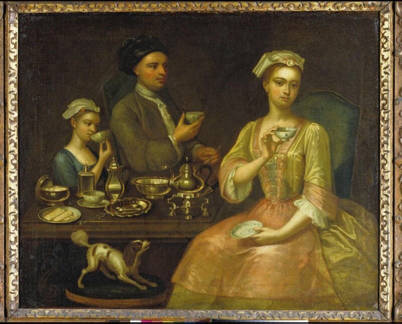 A Family of Three at Tea