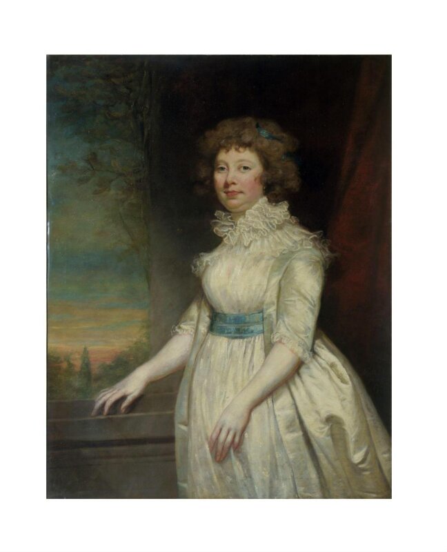 A Lady wearing a white dress
