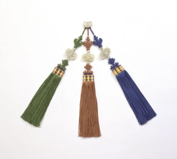 Samjak norigae by Kim Eun-Young featuring a jade butterfly centerpiece with three strands of silk maedeup knots and carved jade bats forming long tassels
