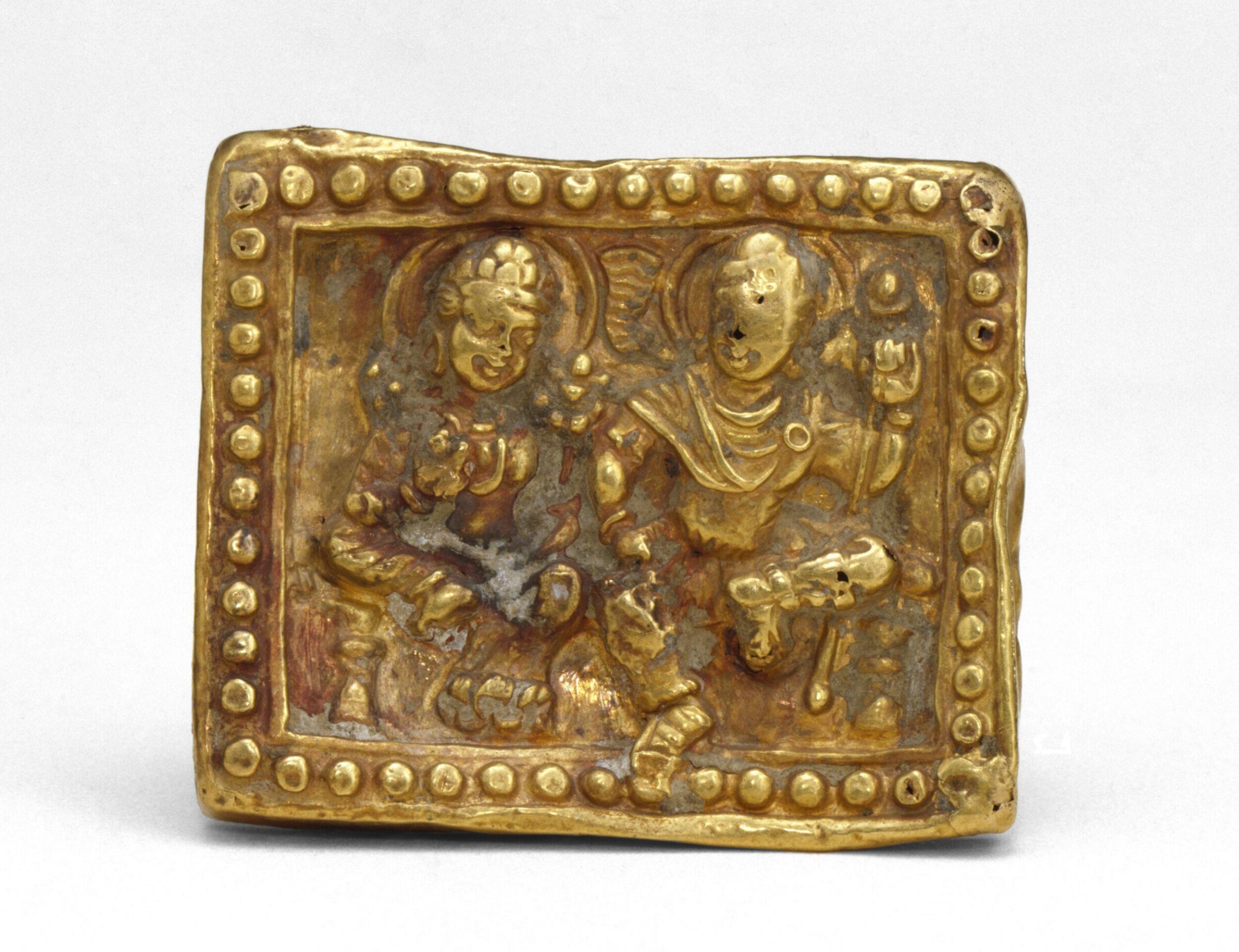Buckle with the Gods Hariti and Pancika, 4th century