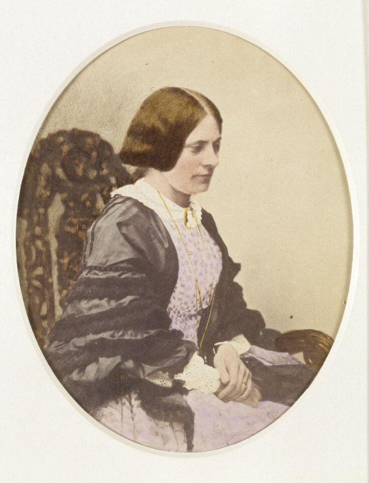 Studio Portrait of a Woman in a Chair top image