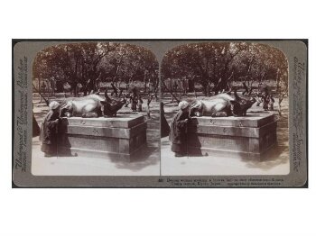 Devout Woman stroking a Bronze Bull to Cure Rheumatism