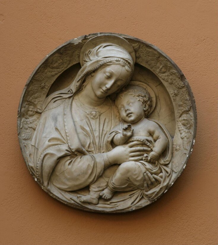 Virgin and Child with a border of cherubim image