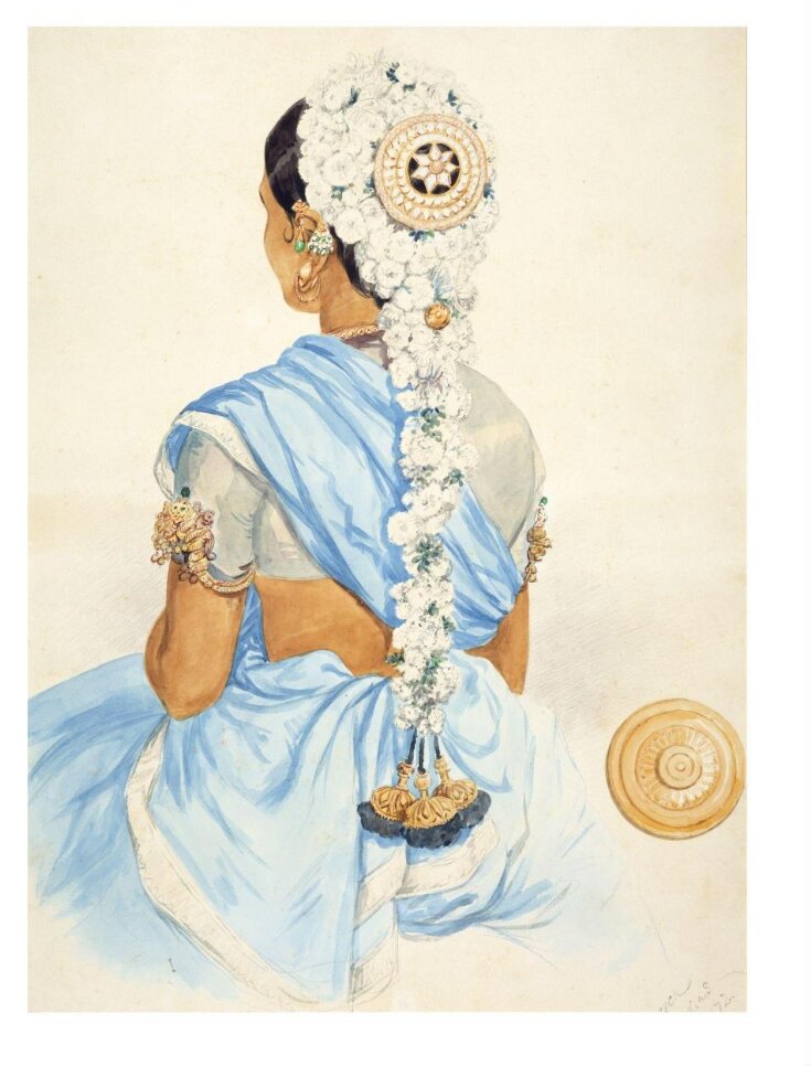 Portrait of a Hindu woman wearing a head-dress top image