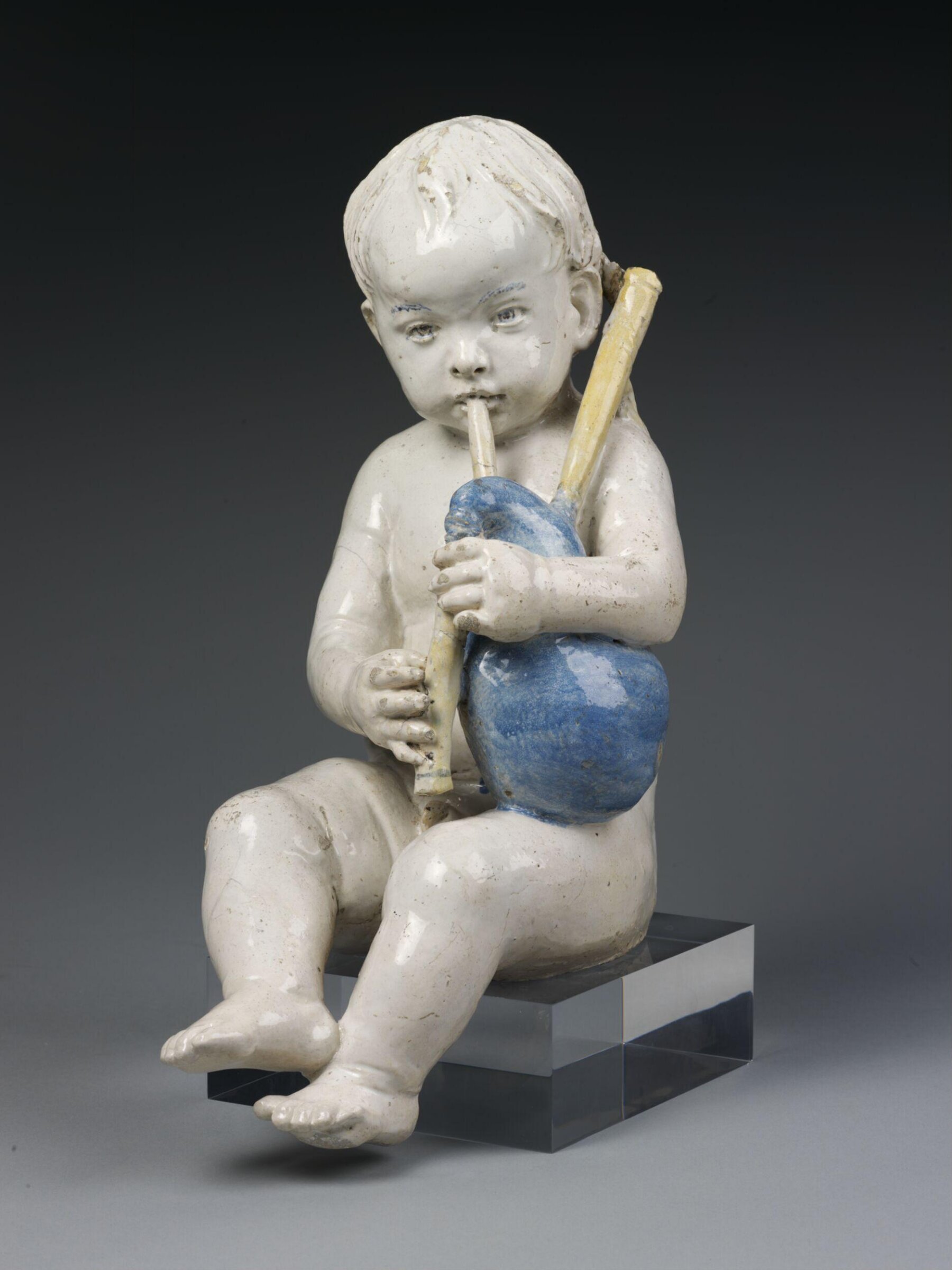 Boy playing the bagpipes, Andrea della Robbia, ca. 1490-1520