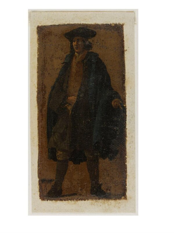 A Man Wearing a Blue Cloak