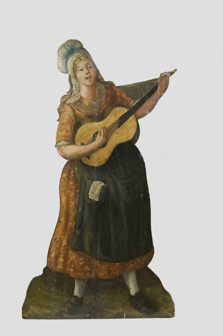 Female Street Player with Guitar top image