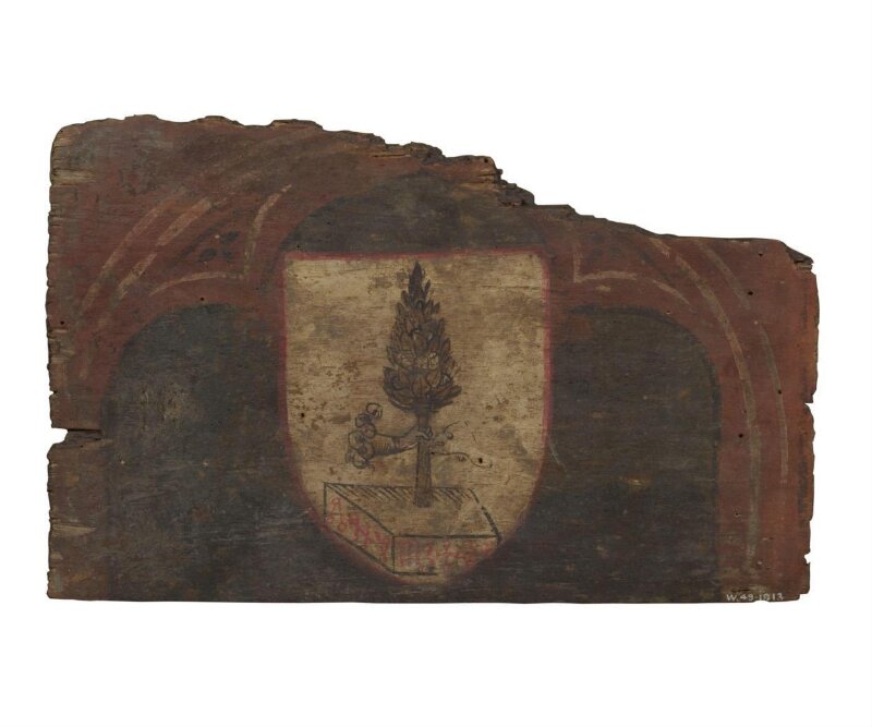 A Shield bearing a hand holding the branch of a tree