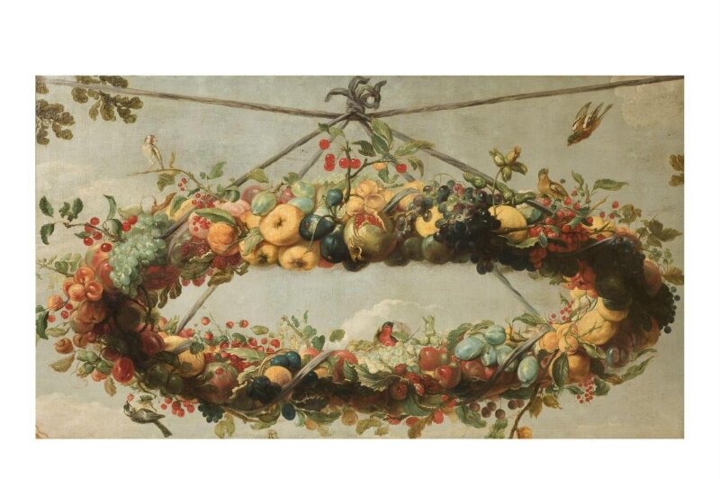 A wreath of fruit, with birds, suspended from a cord