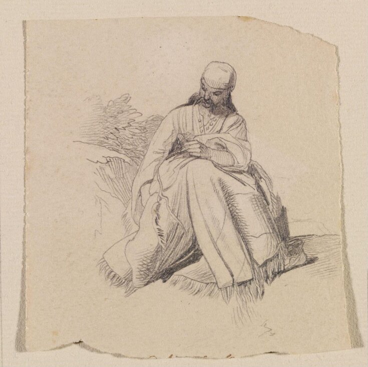 A seated figure top image