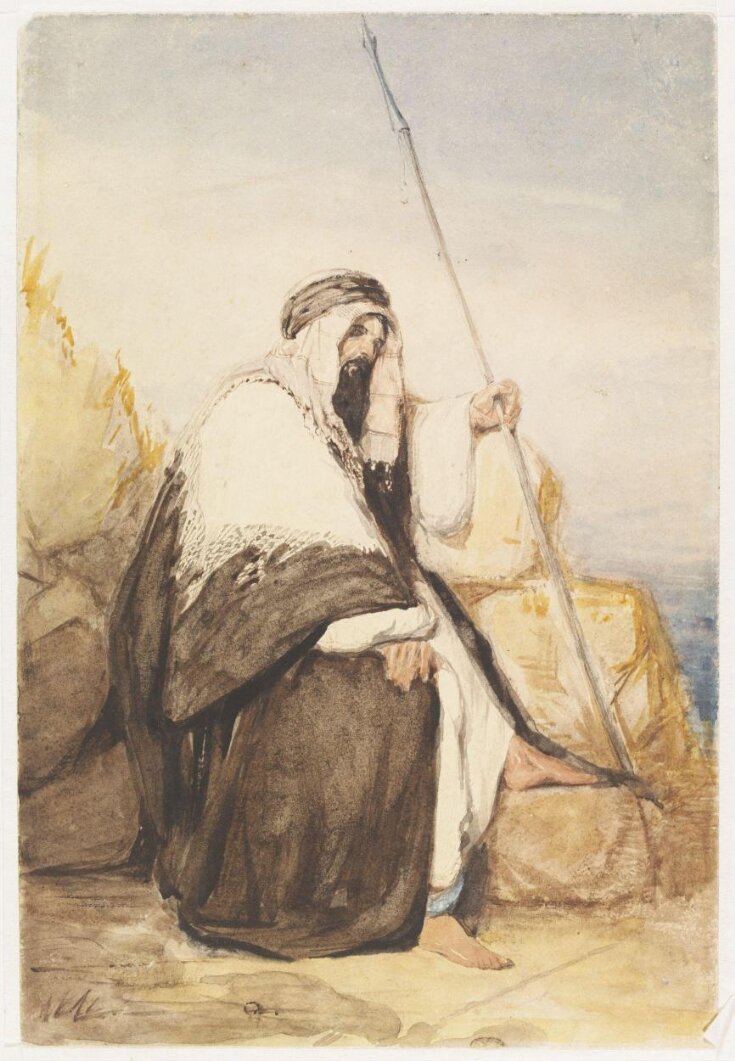 Figure of a Man in Arab dress, seated, holding a spear top image