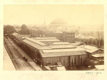 View looking north-west up Exhibition Road towards the Royal Albert Hall, with India Museum gallery entrance in foreground and Horticultural Gardens in background