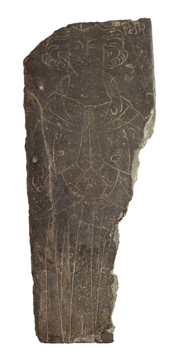 Memorial slab incised with male figure top image