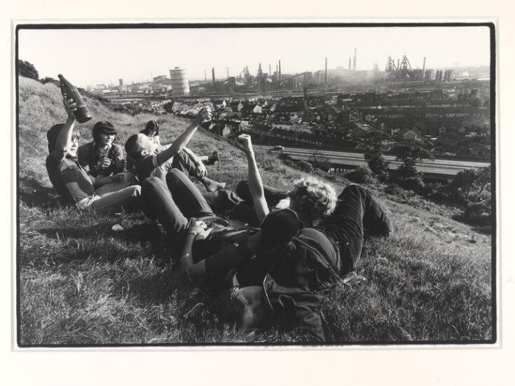 Young people on a hillside above Port Talbot top image