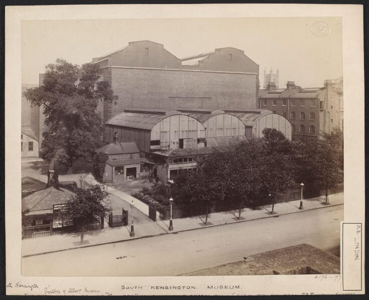 South Kensington Museum, remains of the 'Brompton Boilers', south of the Cast Courts, under demolition with Secretariat block on left, the Cast Courts in background and tower of Holy Trinity Church in distance image