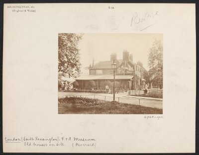 Brompton Park House with transportation wagons parked at side of building