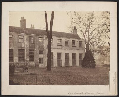 Exterior view of Brompton Park House with the South Kensington Museum (the 'Brompton Boilers') visible in the background