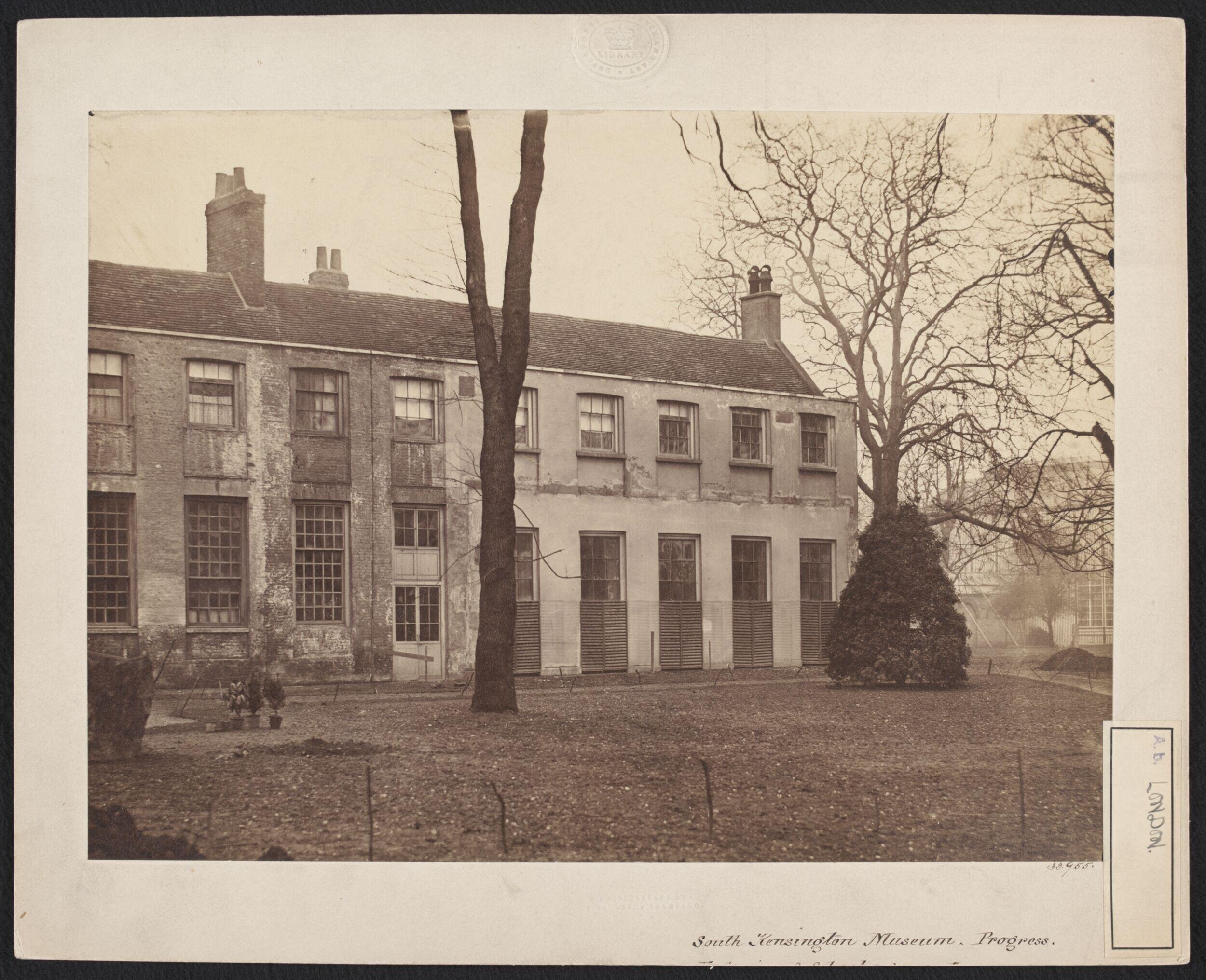 Exterior view of Brompton Park House with the South Kensington Museum (the 'Brompton Boilers') visible in the background