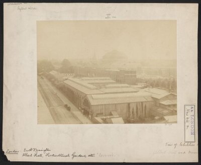 View looking north-west up Exhibition Road towards the Royal Albert Hall, with India Museum gallery entrance in foreground and Horticultural Gardens in background