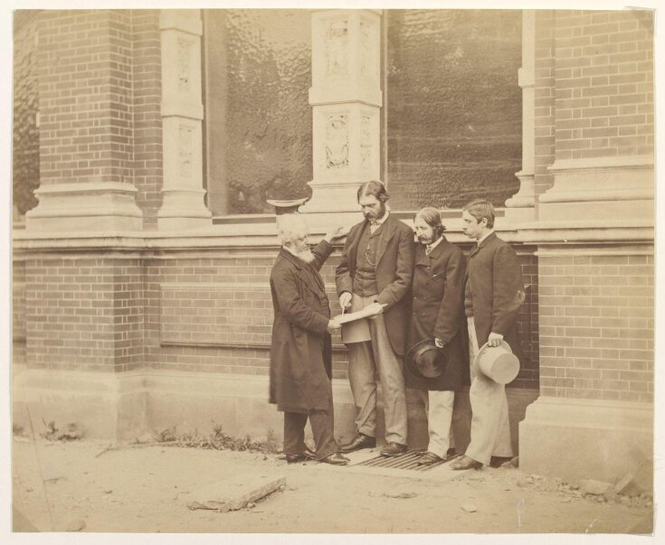 Sir Henry Cole, Captain Francis Fowke, Godfrey Sykes and [?] John Liddell in the Quadrangle garden at the South Kensington Museum image