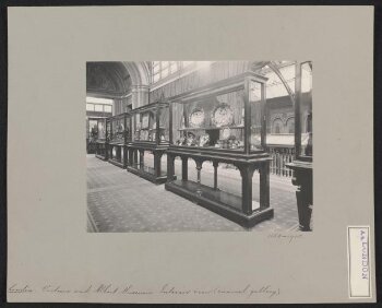 View of cases in Prince Consort's Gallery (Gallery 110) - first floor corridor of South Court (Enamel Gallery)