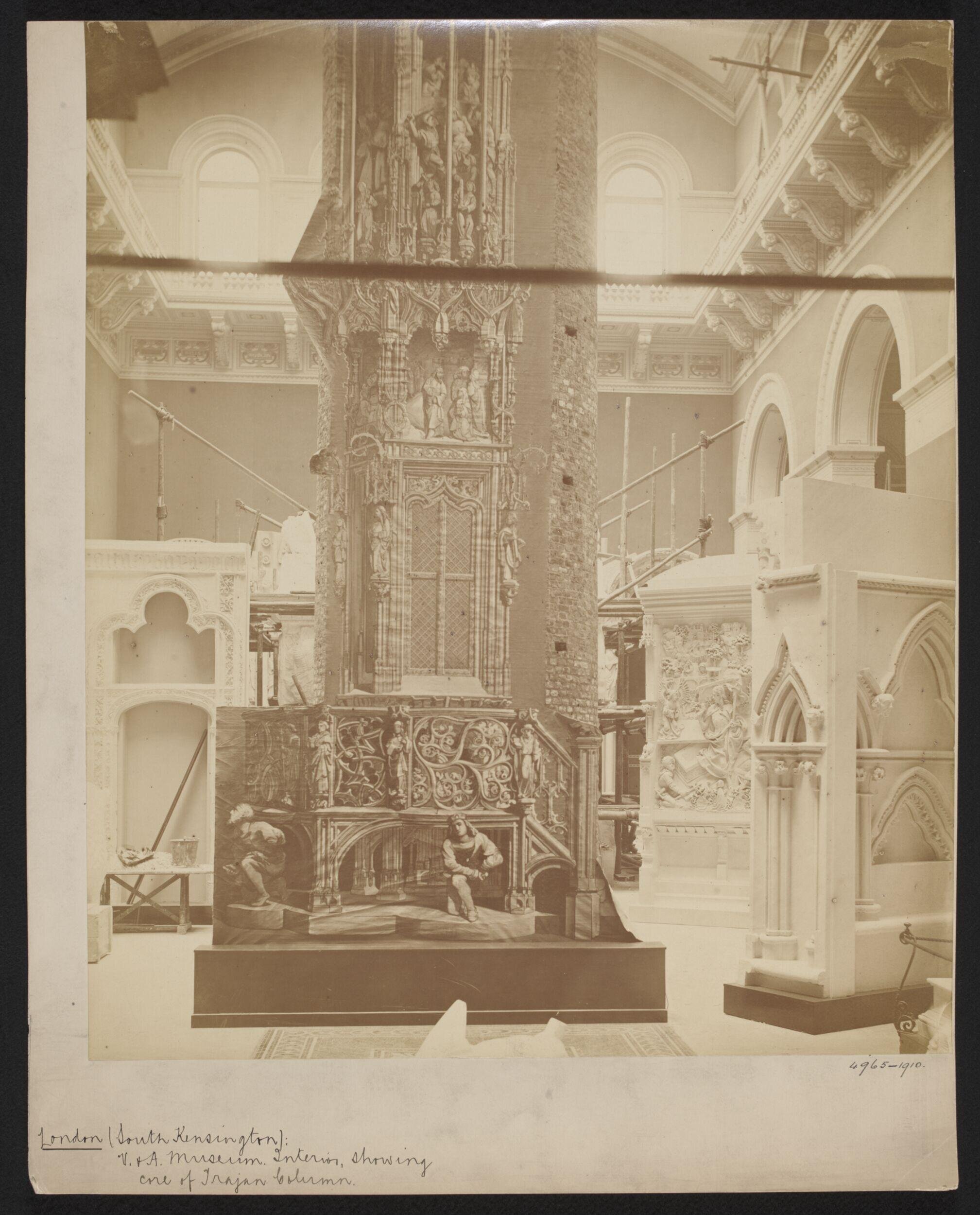 South Kensington Museum, Cast court showing plaster cast of tabernacle from St. Lorenz, Nuremberg and cast of Trajan's Column in background