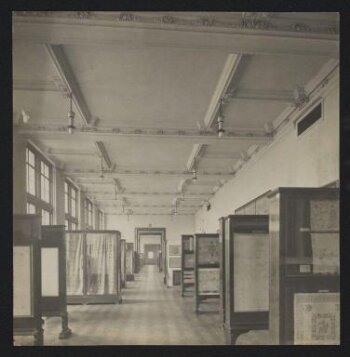 Victoria and Albert Museum, Gallery 120 showing display cases of textiles