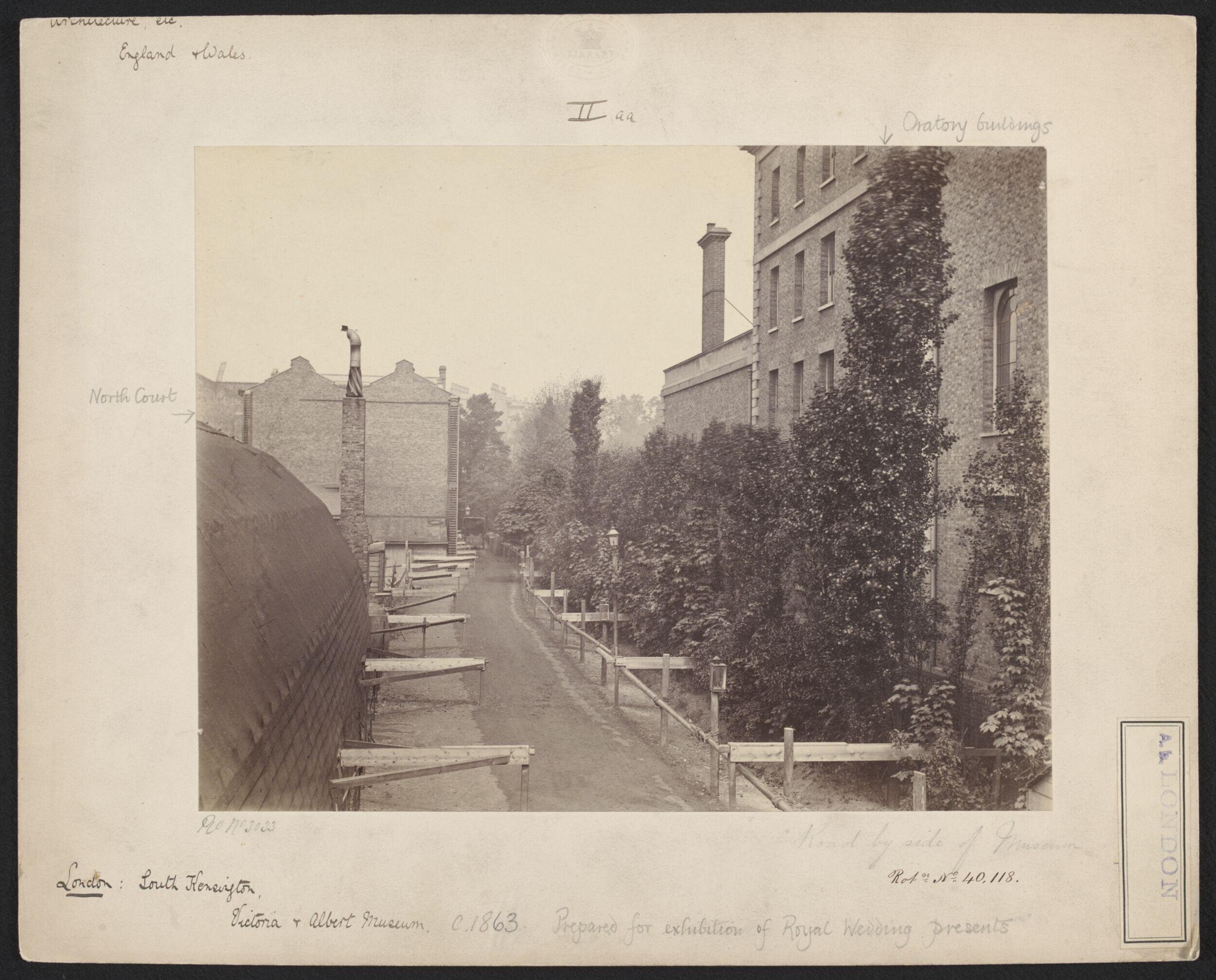Mounted albumen print of the South Kensington Museum, lane between the Brompton Oratory's buildings and the South Kensington Museum