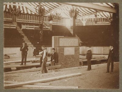 South Kensington Museum, The laying of the foundation stone of the V&A taking place within the temporary wooden pavilion erected at the junction of Exhibition Road and Cromwell Road and designed by Sir Aston Webb to accommodate spectators