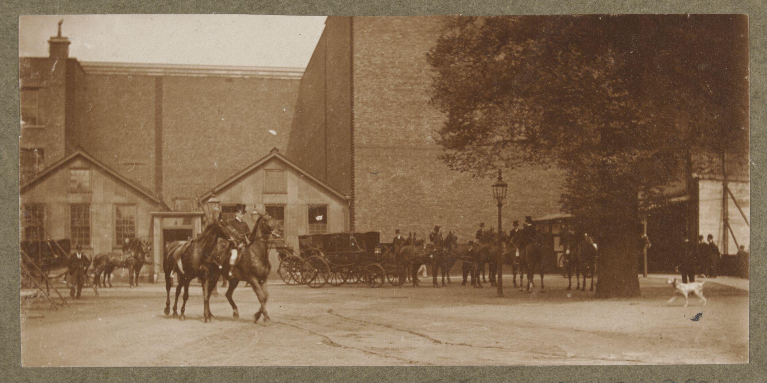Entrance to the South Kensington Museum with Cast Courts and Royal Carriages waiting outside during the laying of the foundation stone