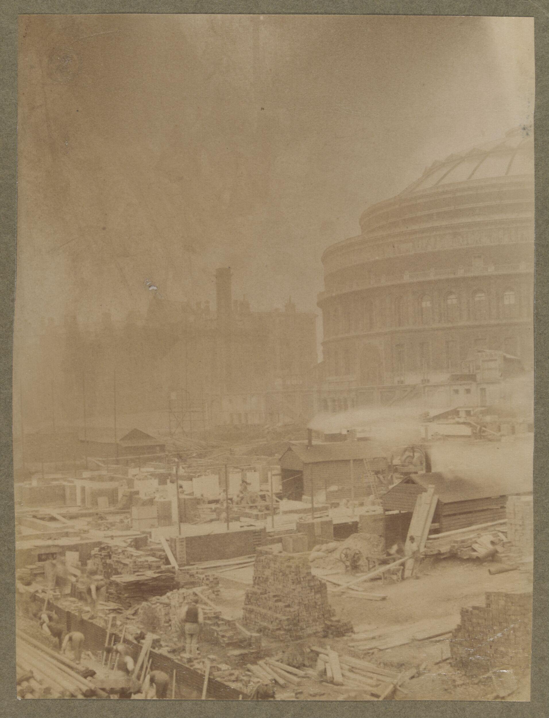 View of building works in front of the Royal Albert Hall (erecting the Albert Memorial?)