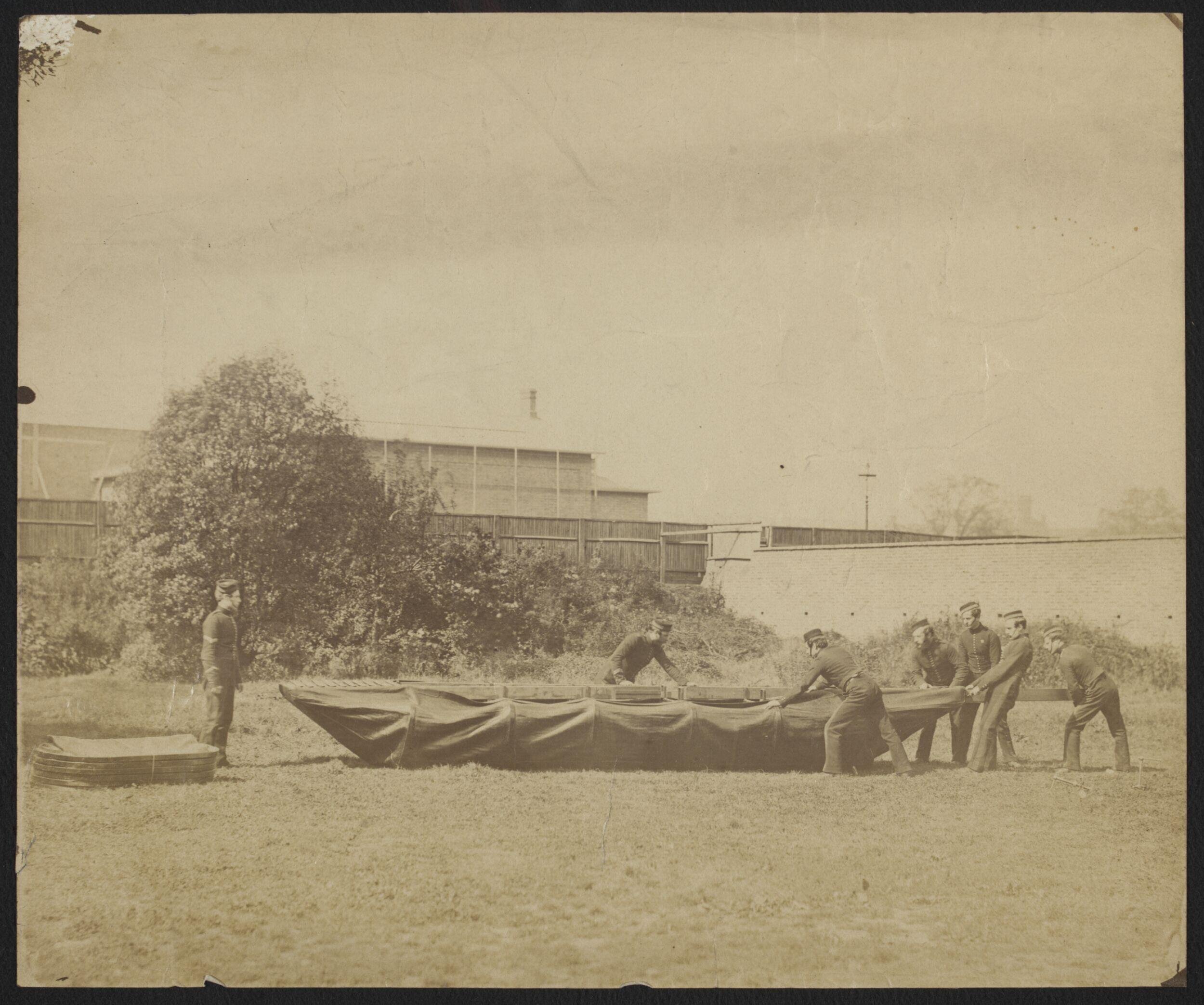 Sappers putting together Captain Fowke's design for a canvas pontoon boat