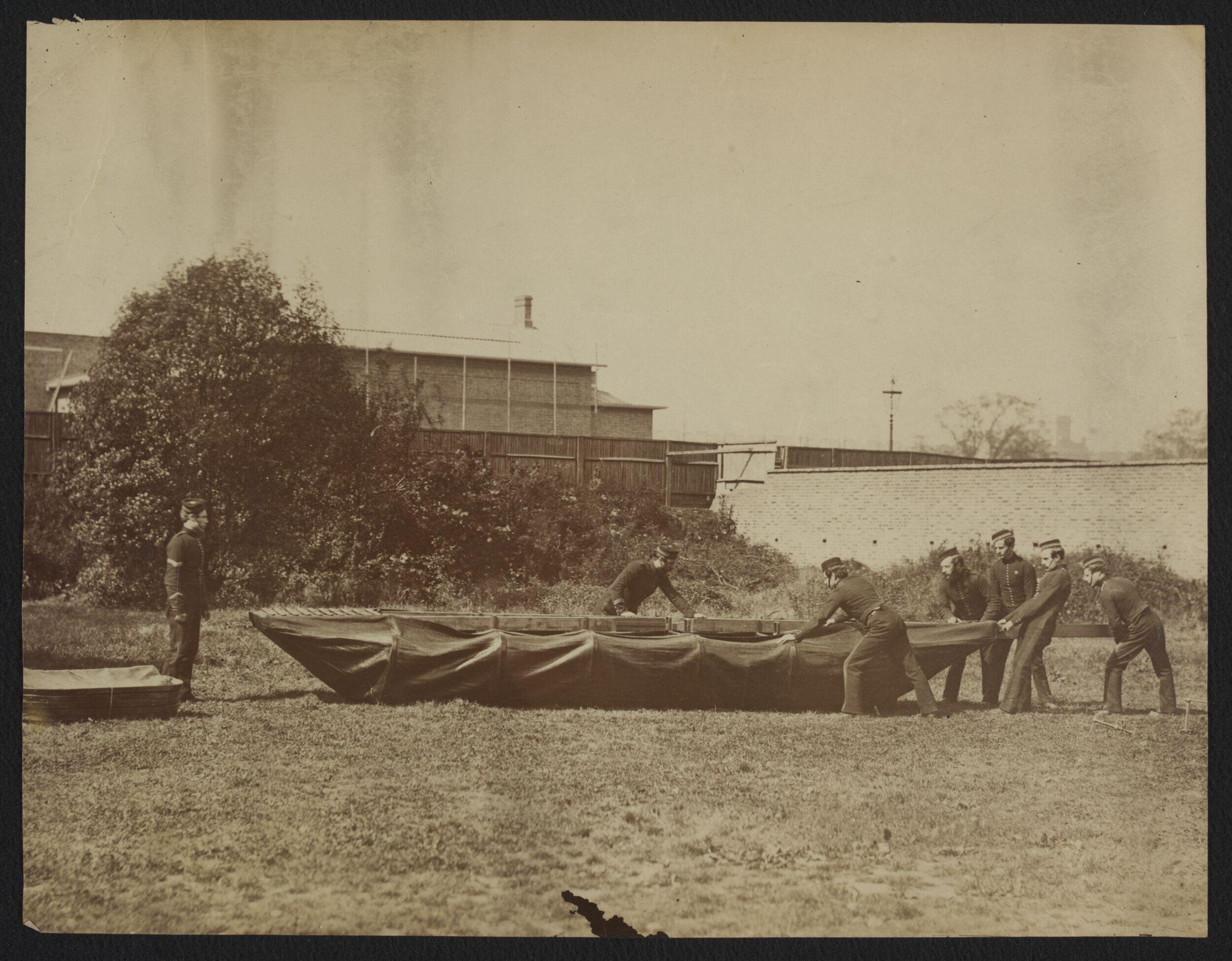 Sappers putting together Captain Fowke's design for a canvas pontoon boat