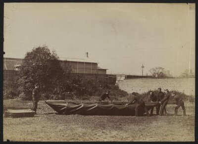 Sappers putting together Captain Fowke's design for a canvas pontoon boat