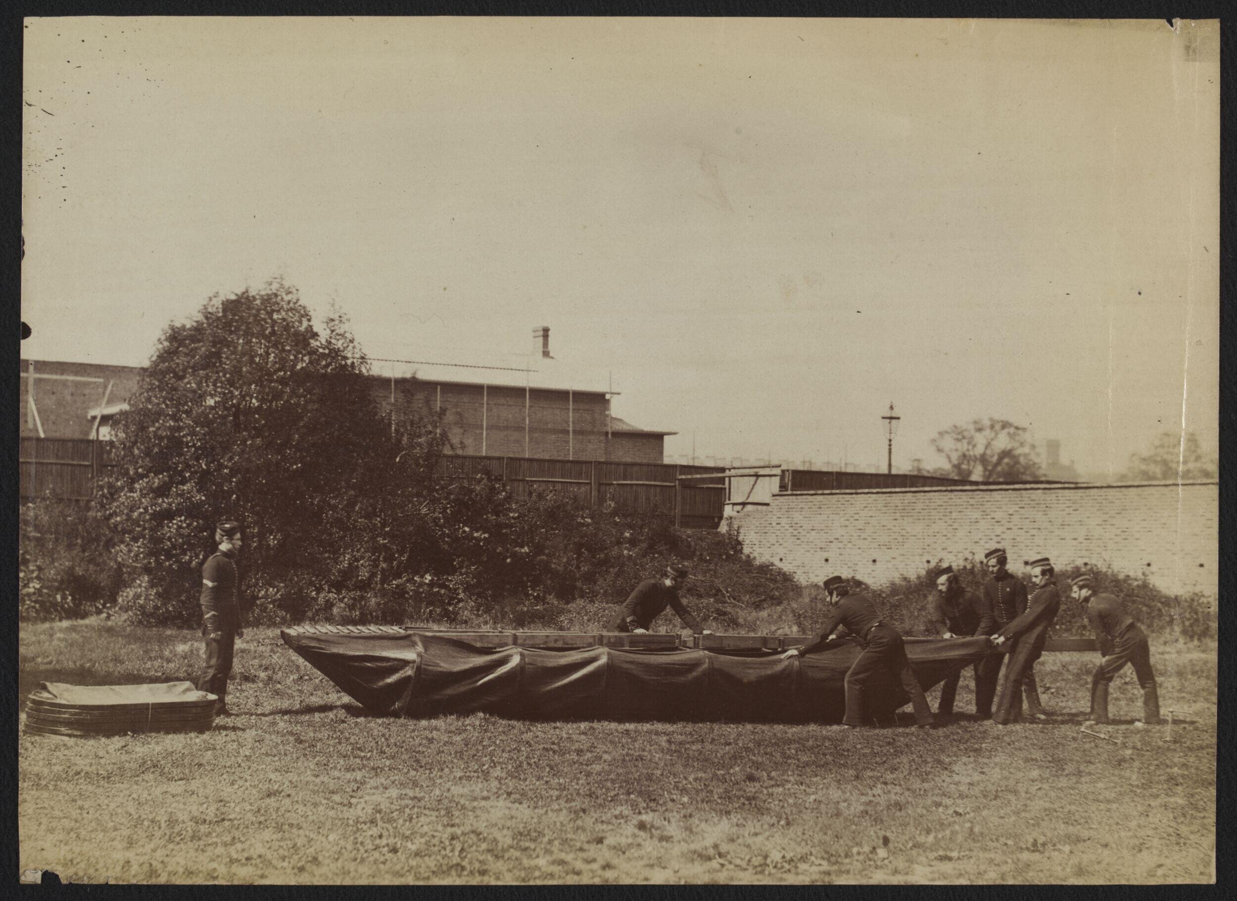 Sappers putting together Captain Fowke's design for a canvas pontoon boat