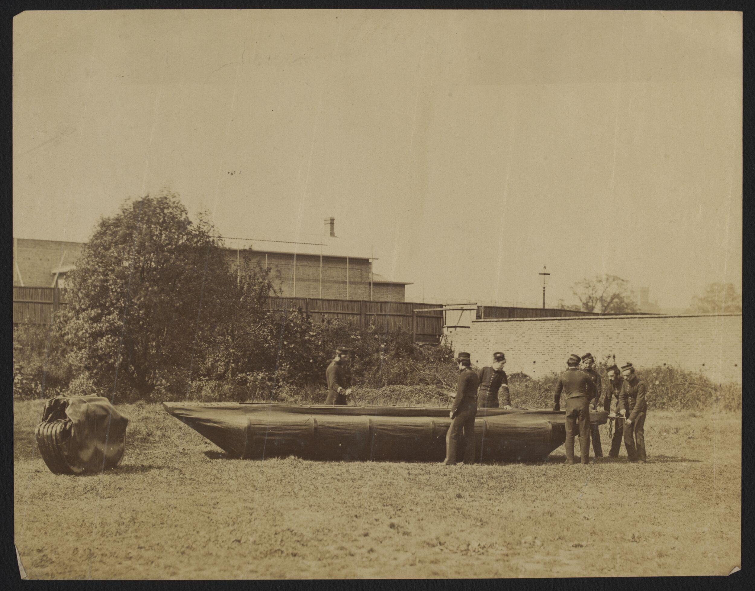 Sappers putting together Captain Fowke's design for a canvas pontoon boat
