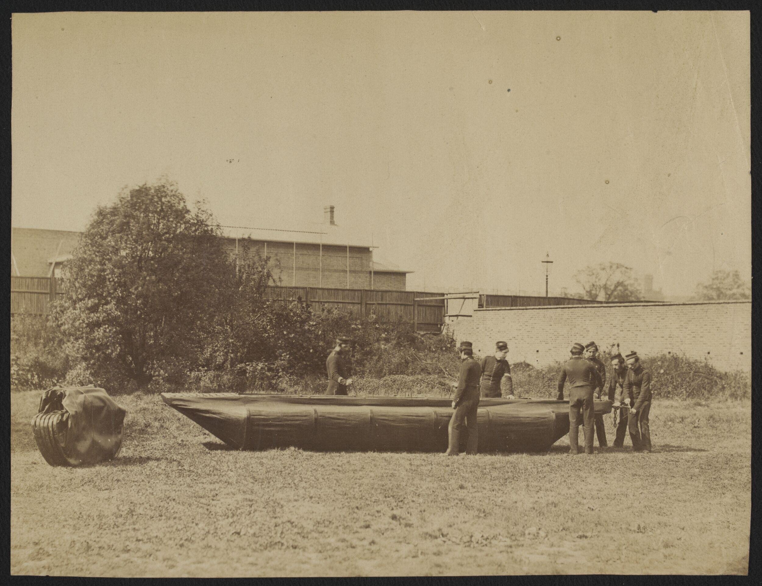 Sappers putting together Captain Fowke's design for a canvas pontoon boat