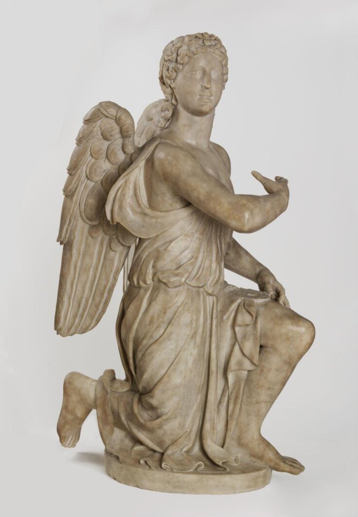 Kneeling angel top image