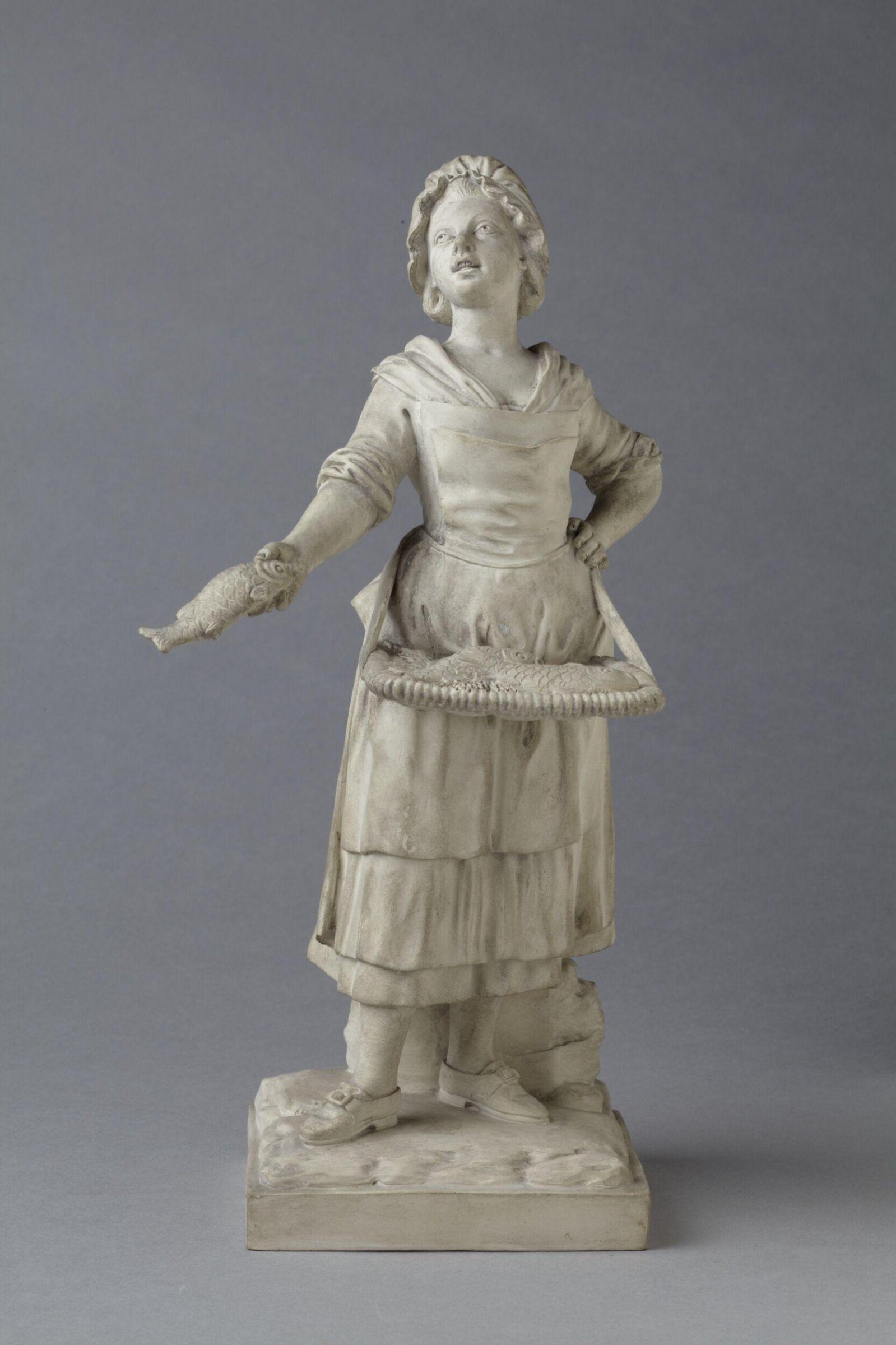 A GIRL SELLING FISH, Lunéville pottery factory, about 1765-1789